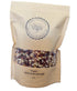 Kraft paper bag of organic multicolor popcorn with Briden Wilson Farms logo.